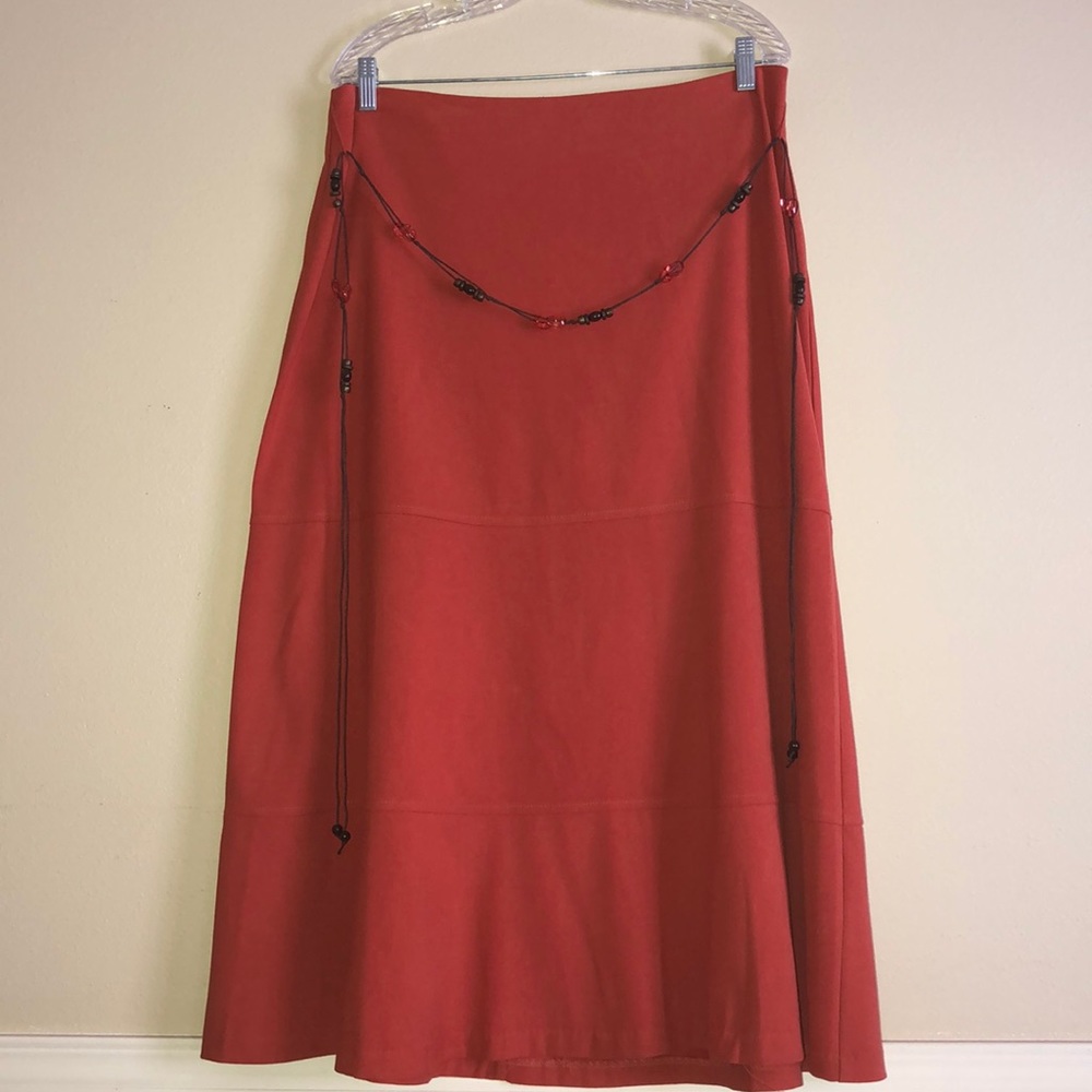 Laura Scott belted a line skirt